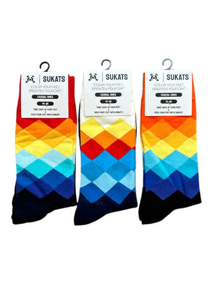 Drie paar kleurrijke Sukats The Casual Ones sokken met ruitpatroon in diverse kleuren.
